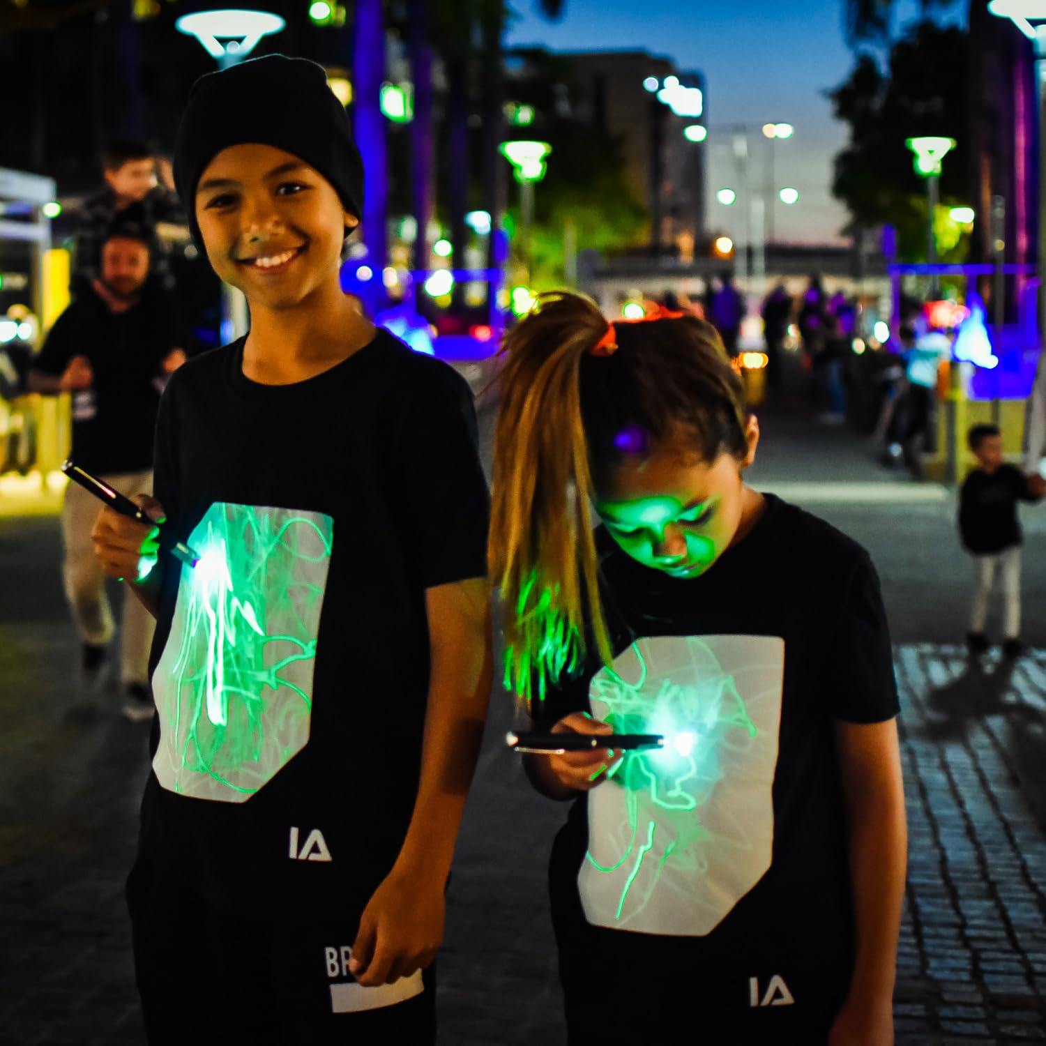 Illuminated Apparel Interactive Glow in The Dark T-Shirt - Fun for Birthday Parties &amp; Festivals (Black/Green Glow, 9-11 Years)